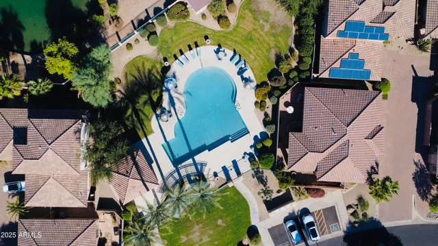 an aerial view of residential houses with outdoor space