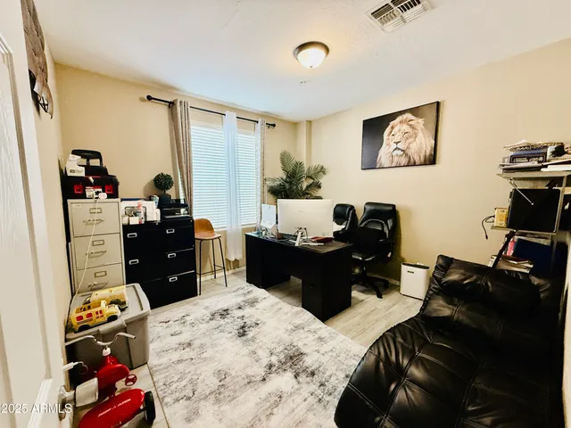 a bed room with a bed and a couch