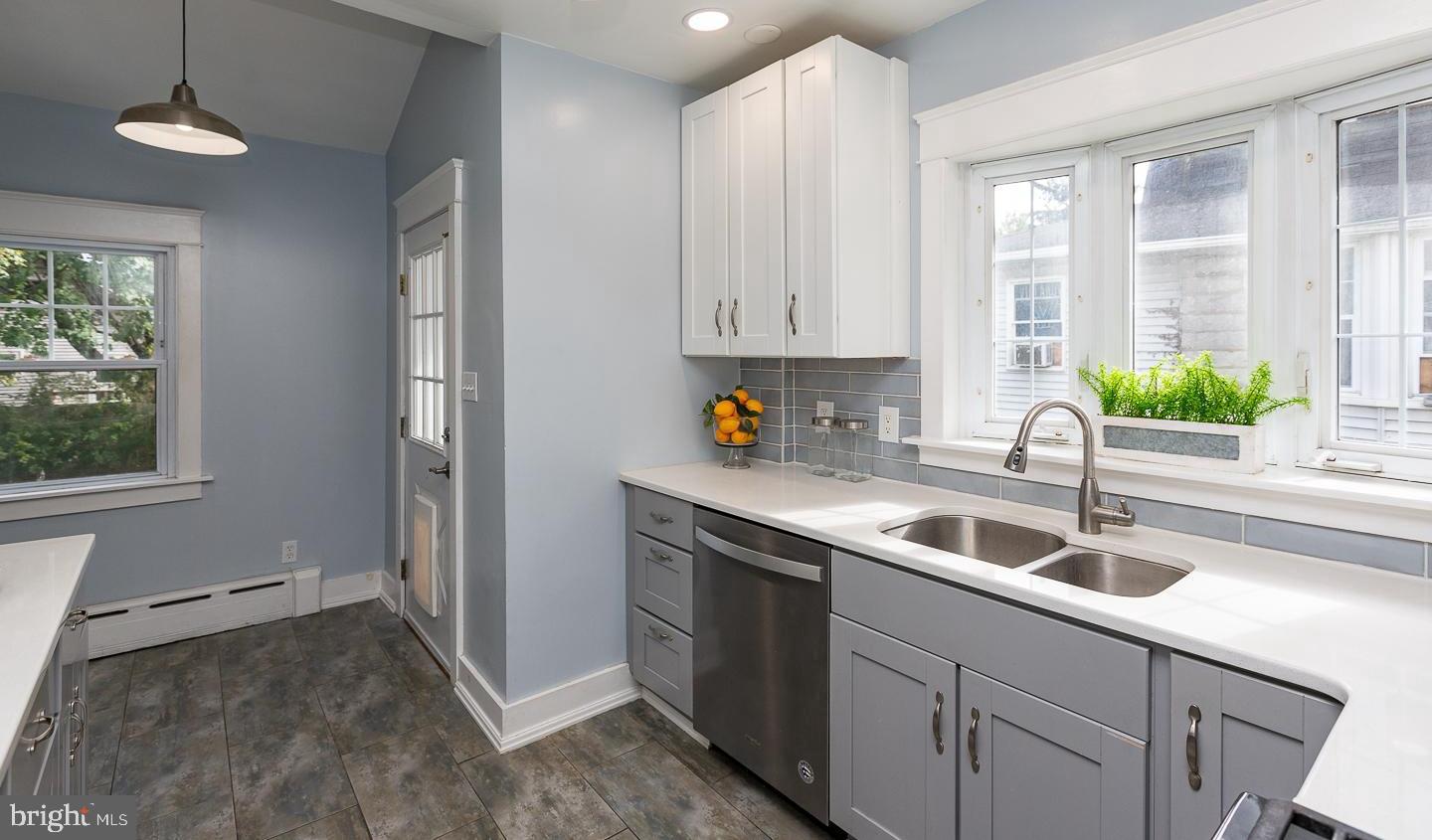 2029 Laurel Road Havertown, PA 19083 - Photo 13 of 45 a kitchen that has a sink and a stove in it
