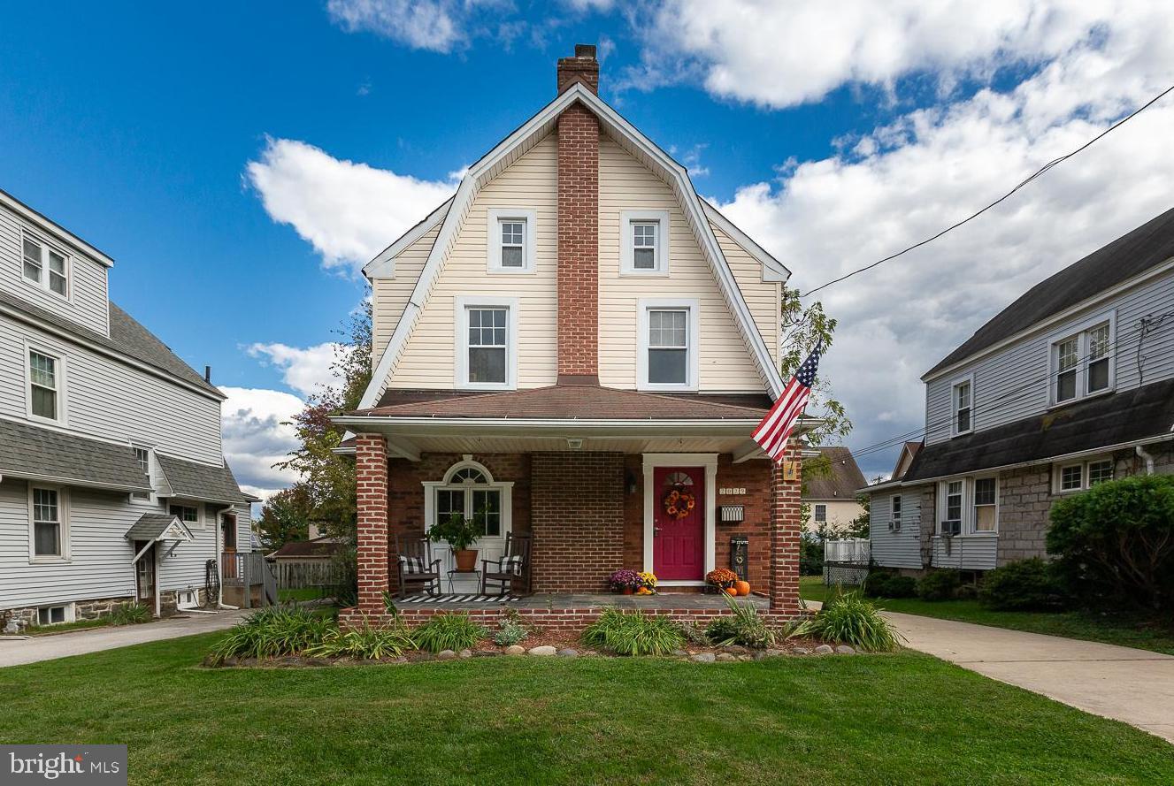2029 Laurel Road Havertown, PA 19083 - Photo 2 of 45 a front view of a house with a yard and porch