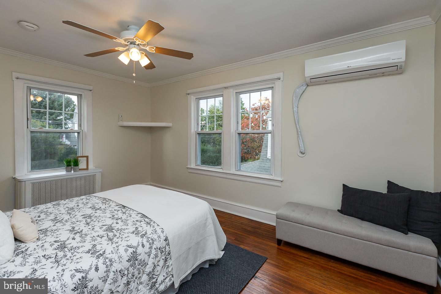 2029 Laurel Road Havertown, PA 19083 - Photo 25 of 45 a bedroom with a bed chandelier and window