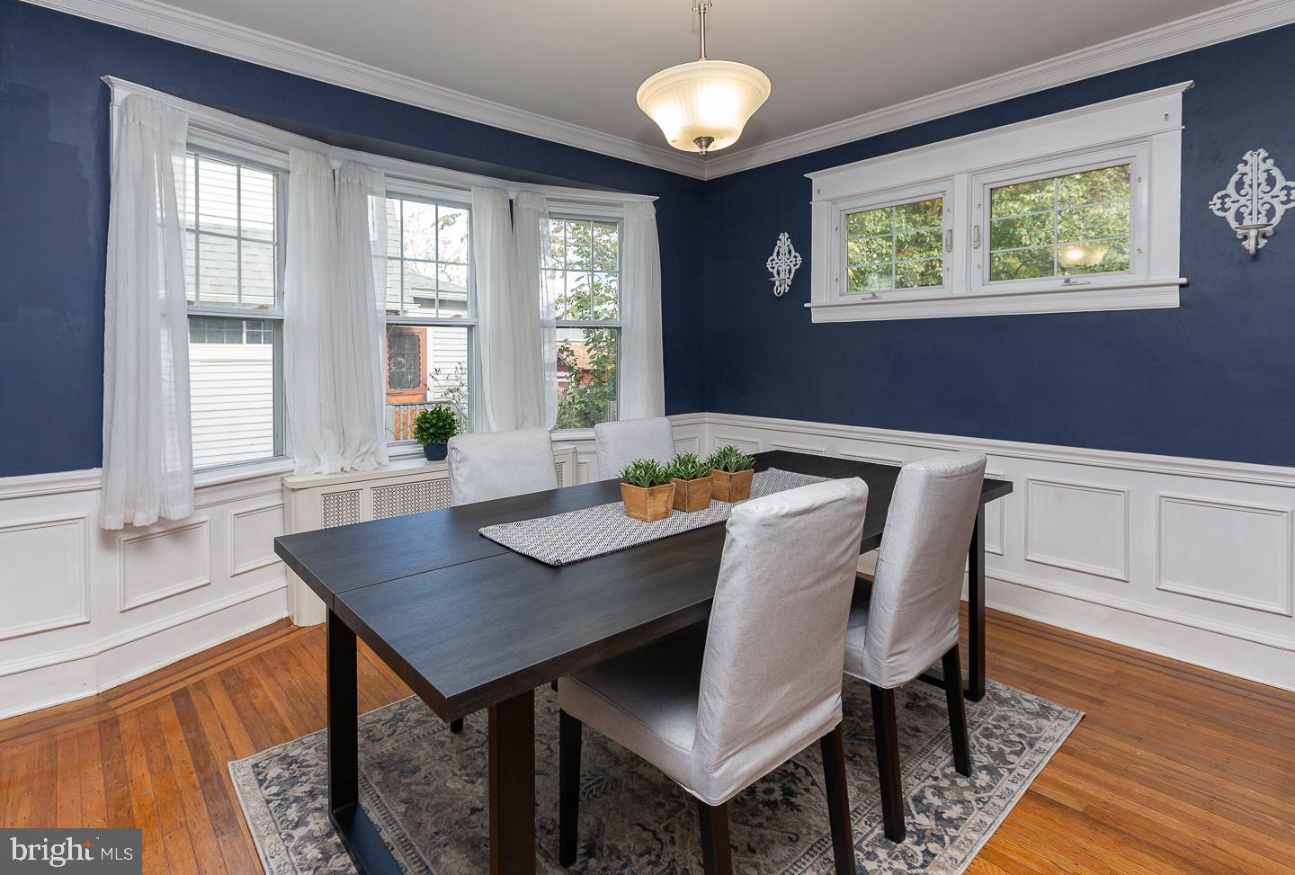 2029 Laurel Road Havertown, PA 19083 - Photo 10 of 45 a view of a dining room with furniture and wooden floor