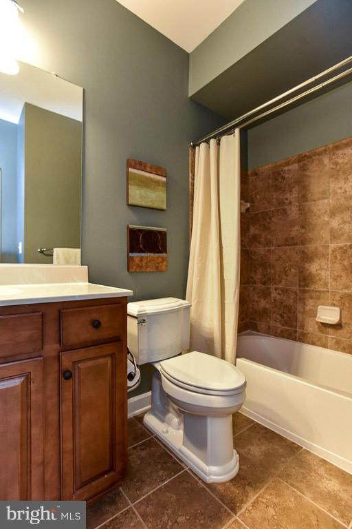 25175 Prairie Fire Square Aldie, VA 20105 - Photo 22 of 28 a bathroom with a sink toilet and shower