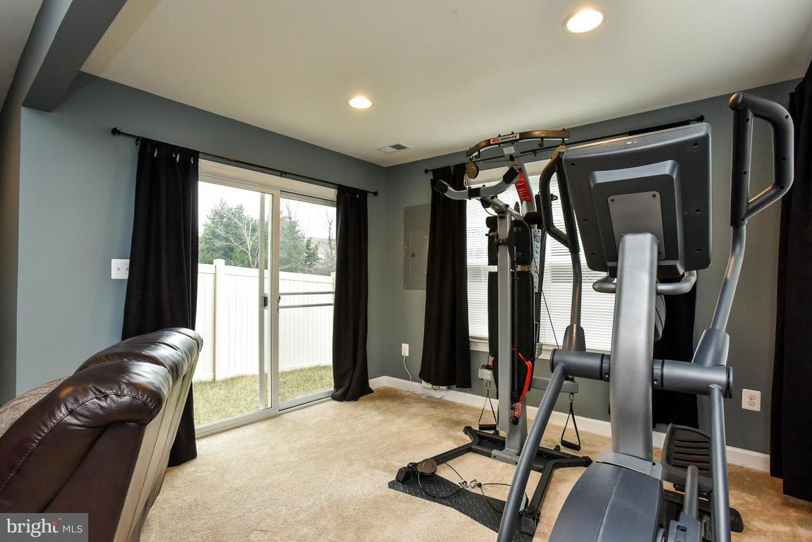25175 Prairie Fire Square Aldie, VA 20105 - Photo 26 of 28 a view of a livingroom with furniture and windows