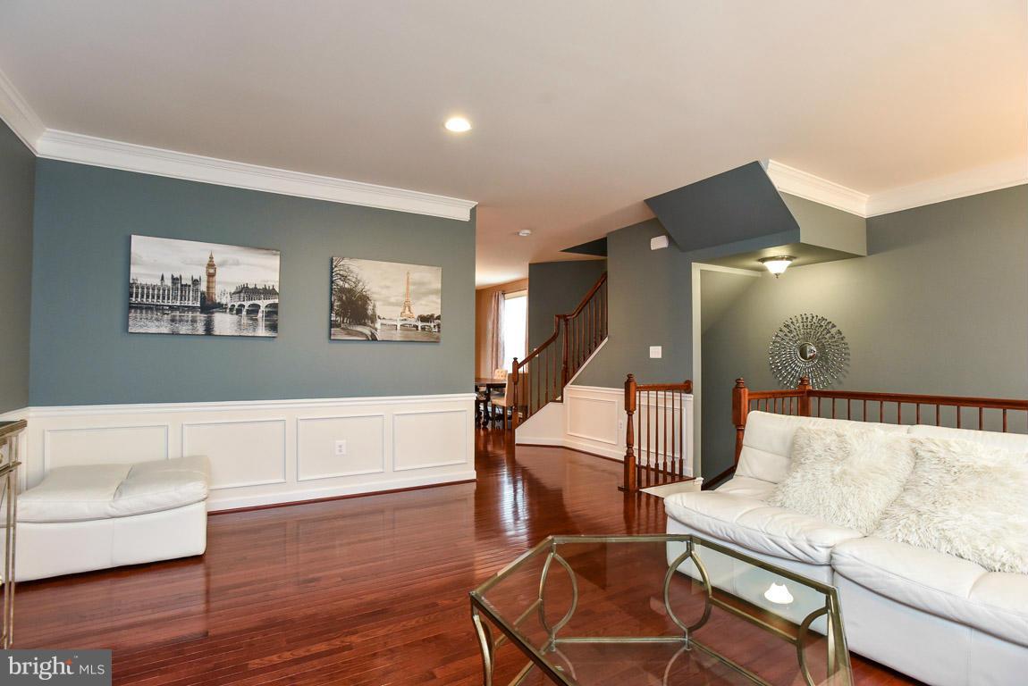 25175 Prairie Fire Square Aldie, VA 20105 - Photo 6 of 28 a living room with furniture and a wooden floor