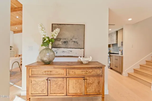 a kitchen with a stove and cabinets