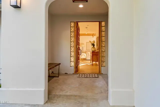 a bathroom with a tub and shower