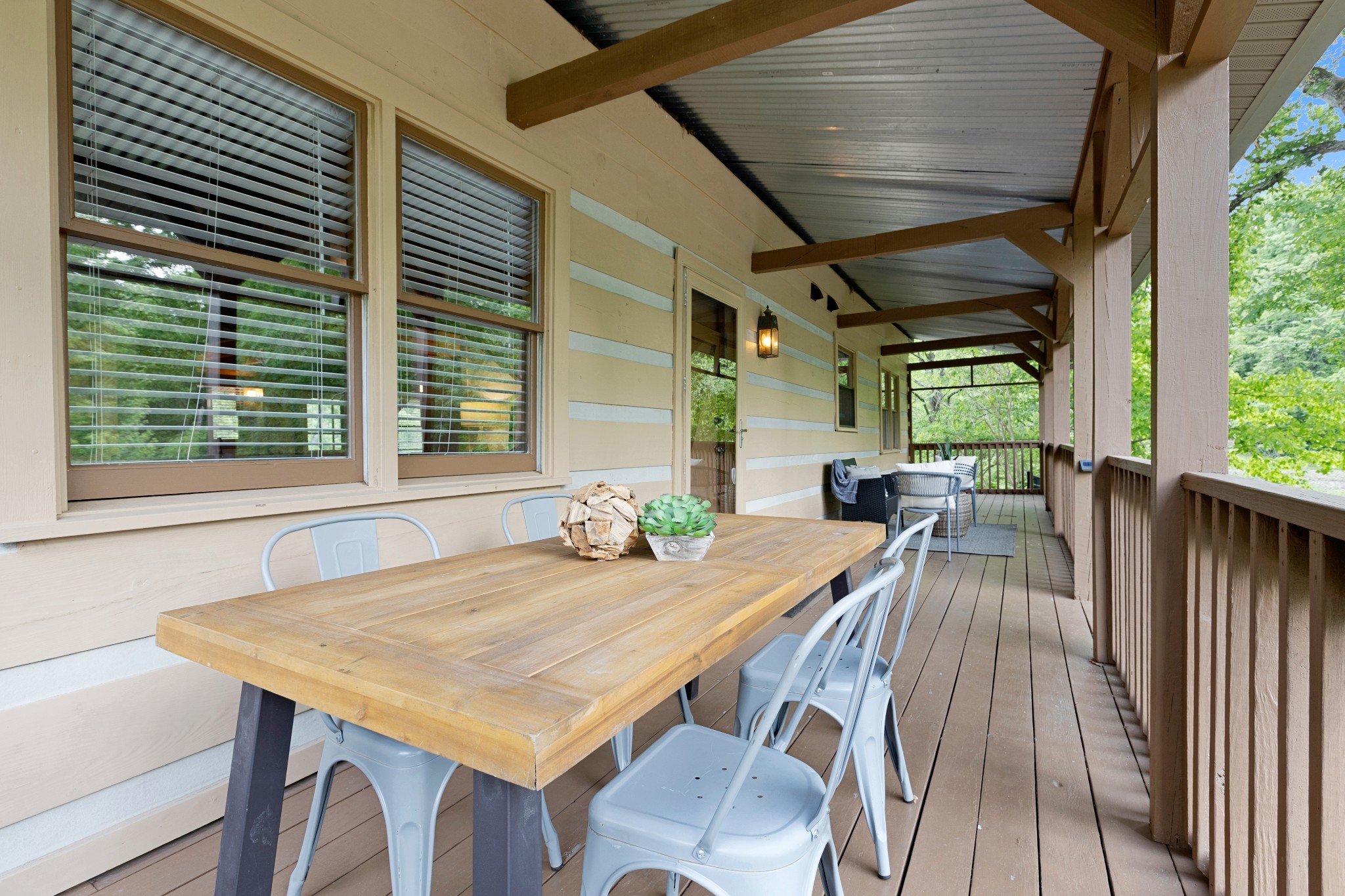 1708 Sugar Ridge Road Spring Hill, TN 37174 - Photo 42 of 59 a view of a patio with table and chairs with wooden floor and fence