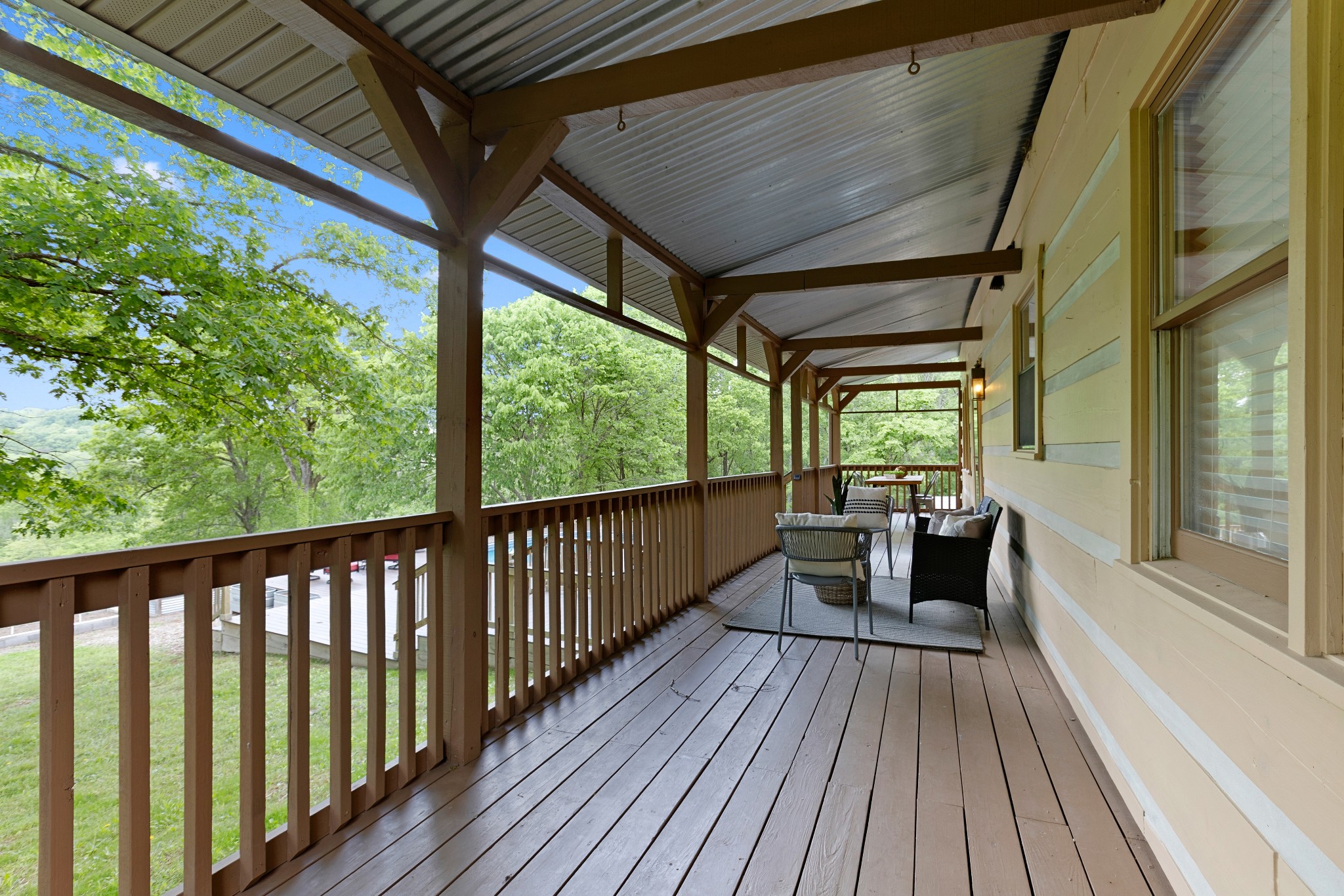 1708 Sugar Ridge Road Spring Hill, TN 37174 - Photo 43 of 59 a view of balcony with couch and wooden floor