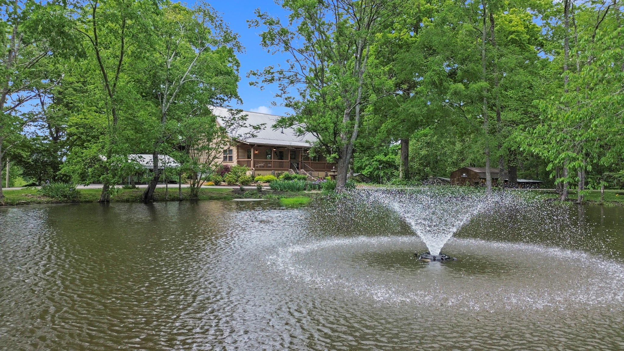 1708 Sugar Ridge Road Spring Hill, TN 37174 - Photo 55 of 59 a view of a lake with houses