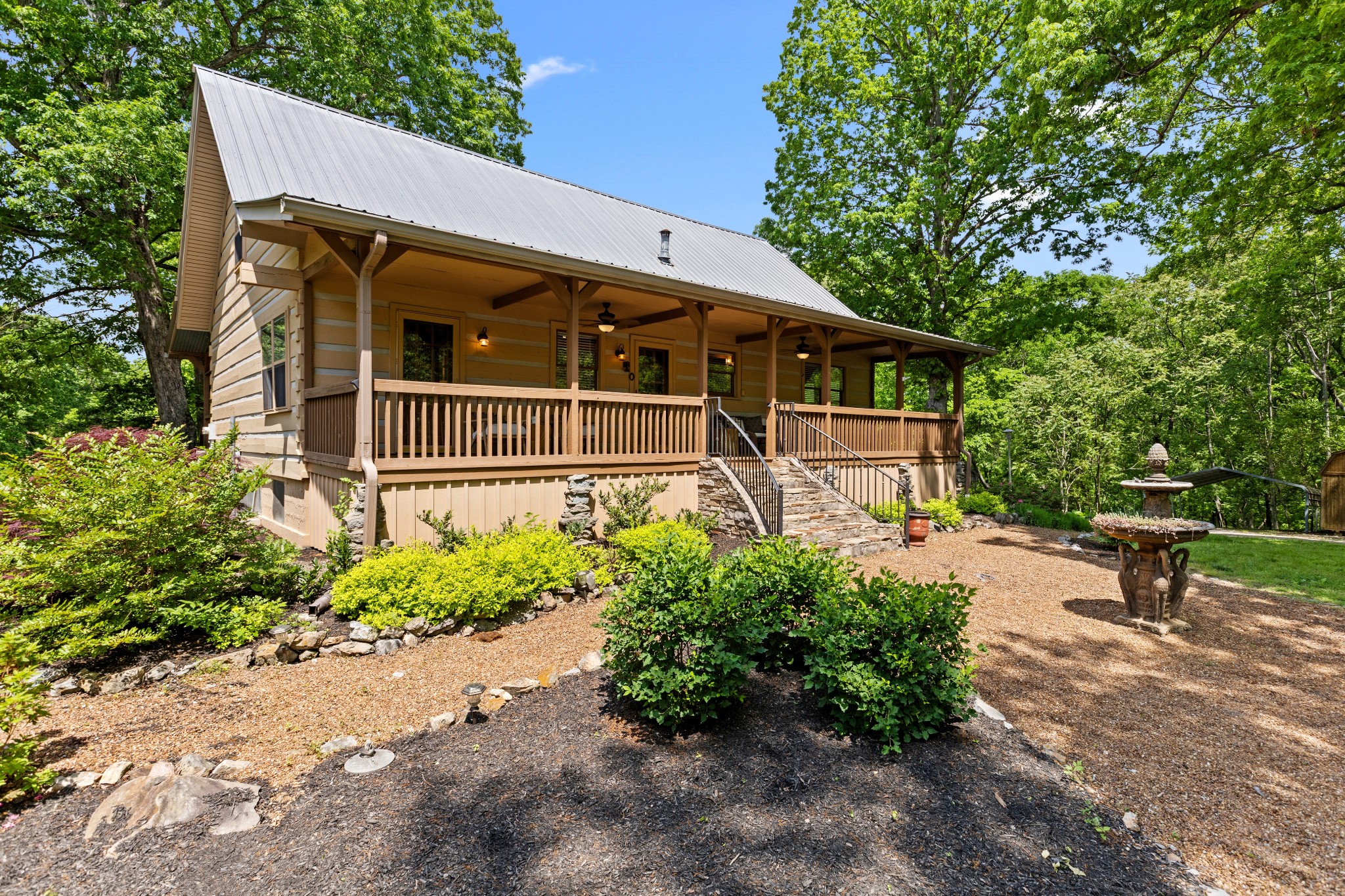 1708 Sugar Ridge Road Spring Hill, TN 37174 - Photo 7 of 59 a front view of a house with garden