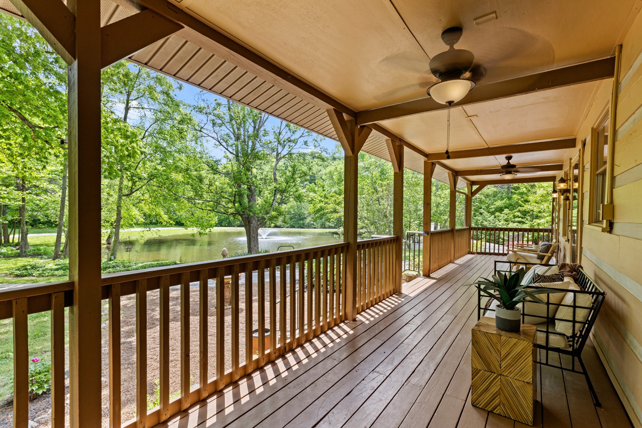 1708 Sugar Ridge Road Spring Hill, TN 37174 - Photo 8 of 59 a view of a porch with furniture and wooden floor