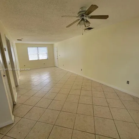 a kitchen with stainless steel appliances a sink stove and refrigerator