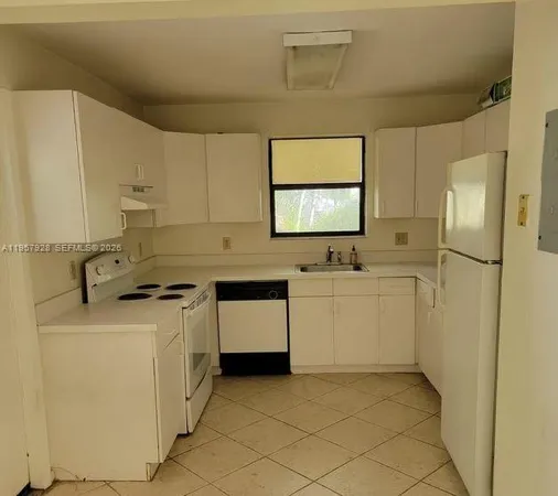 a view of a utility room with washer and dryer