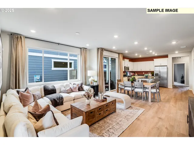 a living room with furniture and a table
