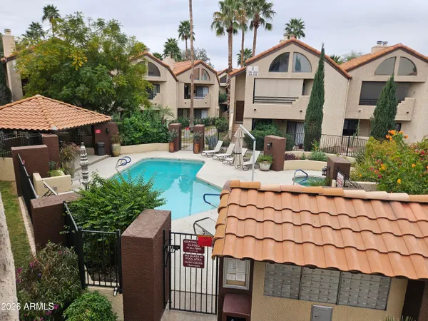a kitchen with counter top space and stainless steel appliances