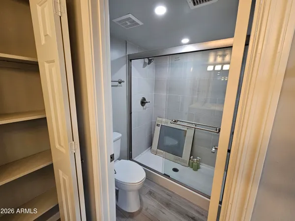 a bathroom with a double vanity sink and mirror