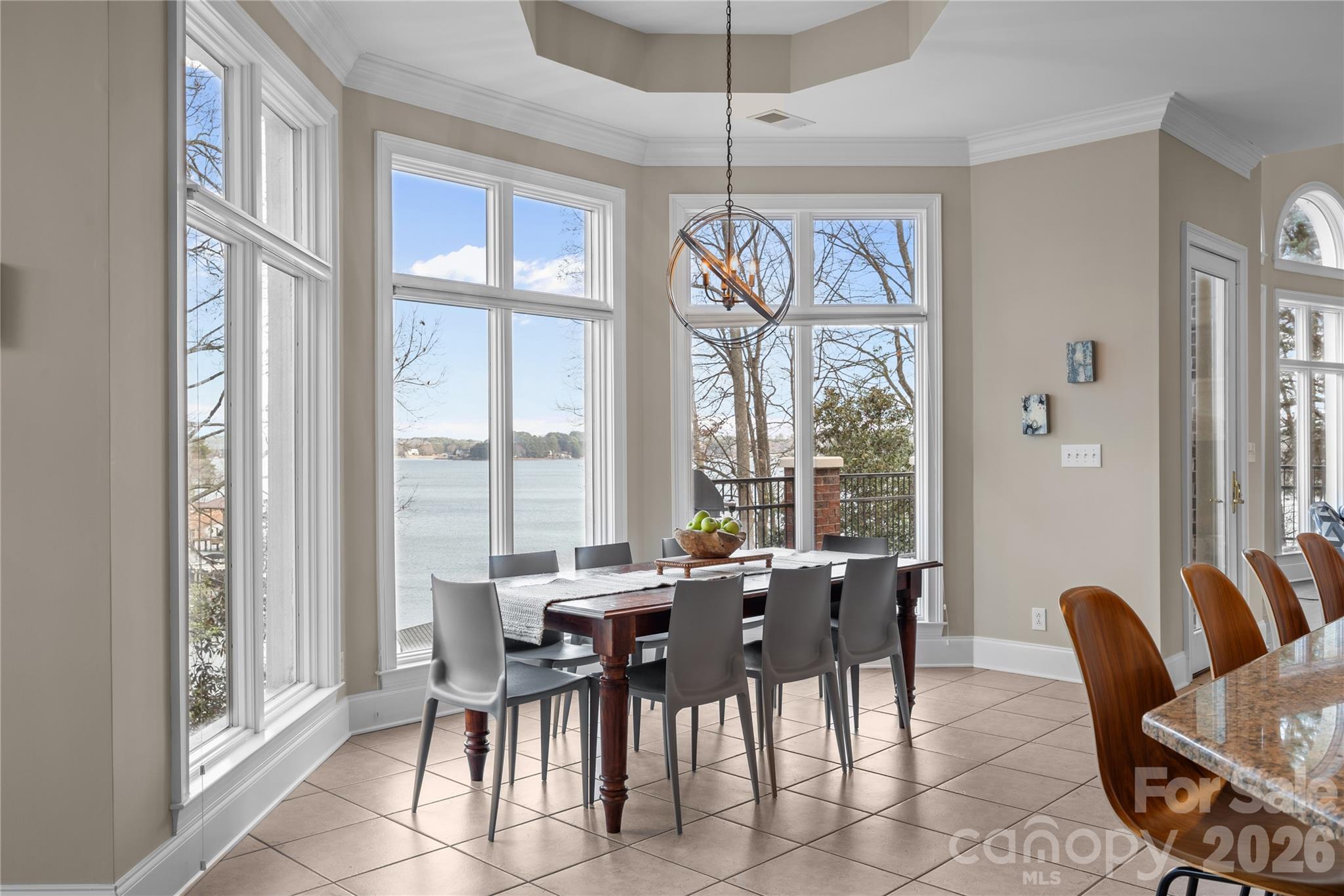 8052 Westbay Road Denver, NC 28037 - Photo 12 of 45 a view of a dining room with furniture window and outside view