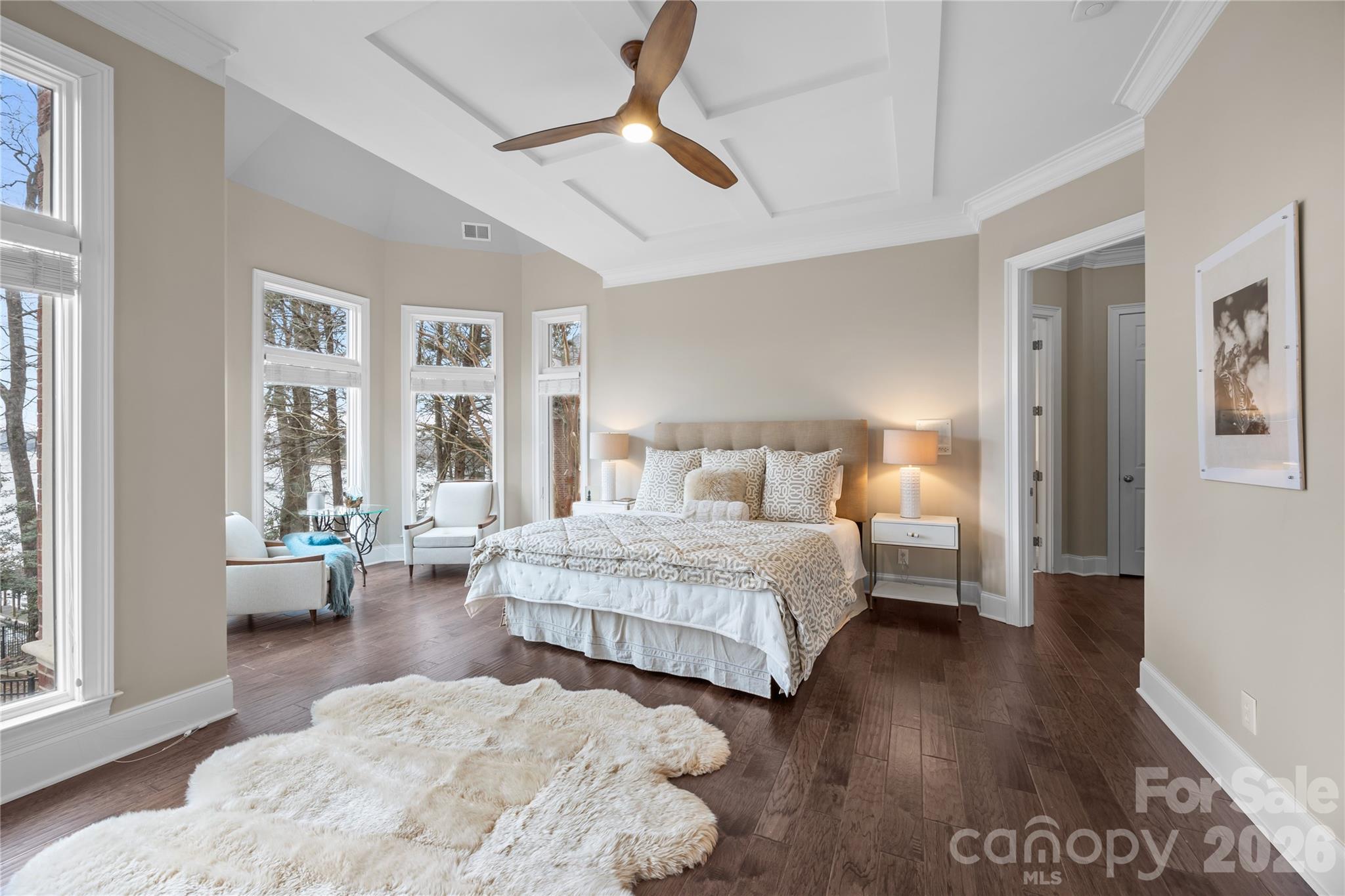 8052 Westbay Road Denver, NC 28037 - Photo 19 of 45 a spacious bedroom with a large bed and a couch