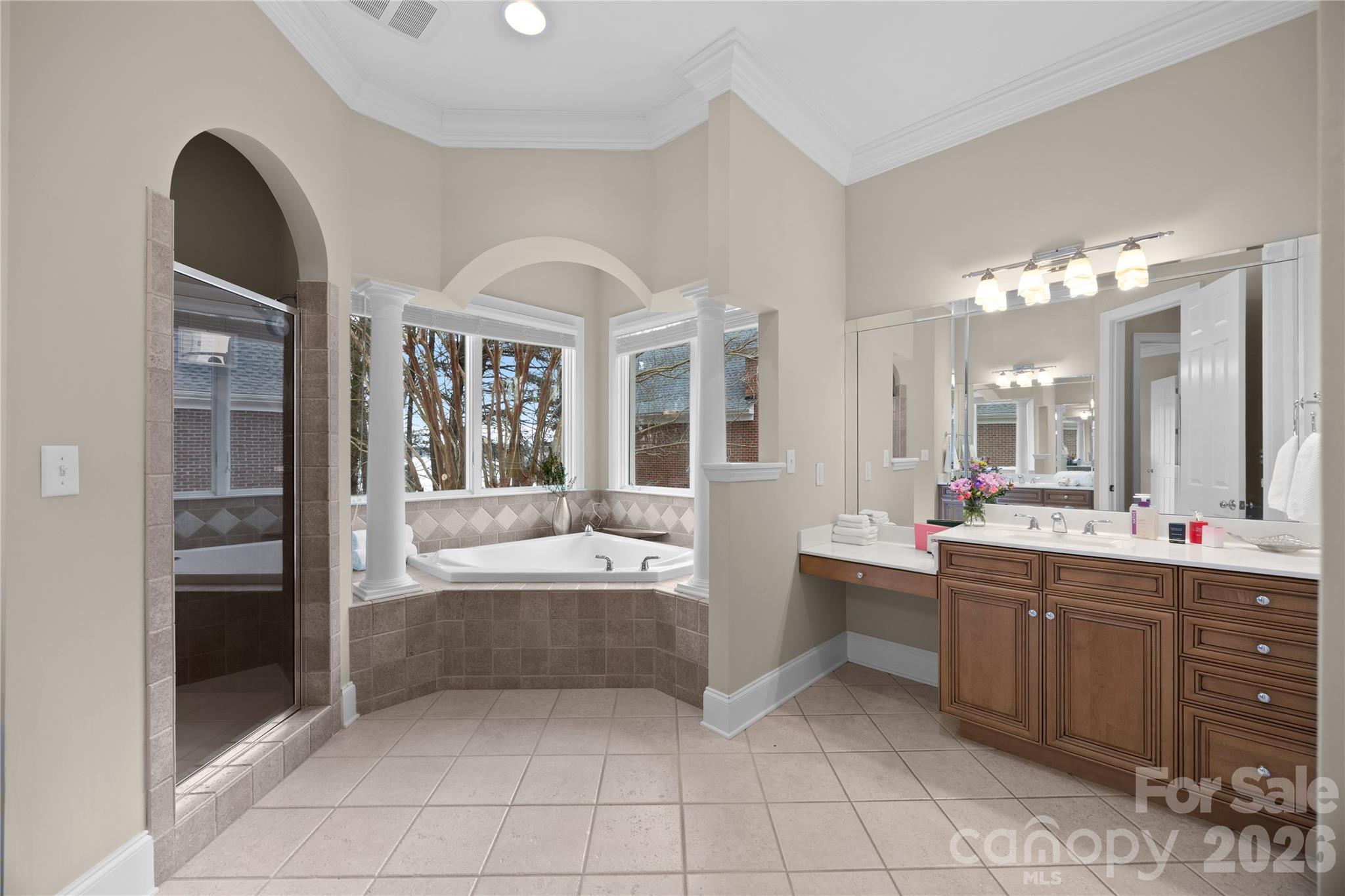 8052 Westbay Road Denver, NC 28037 - Photo 20 of 45 a large bathroom with a large tub and sink