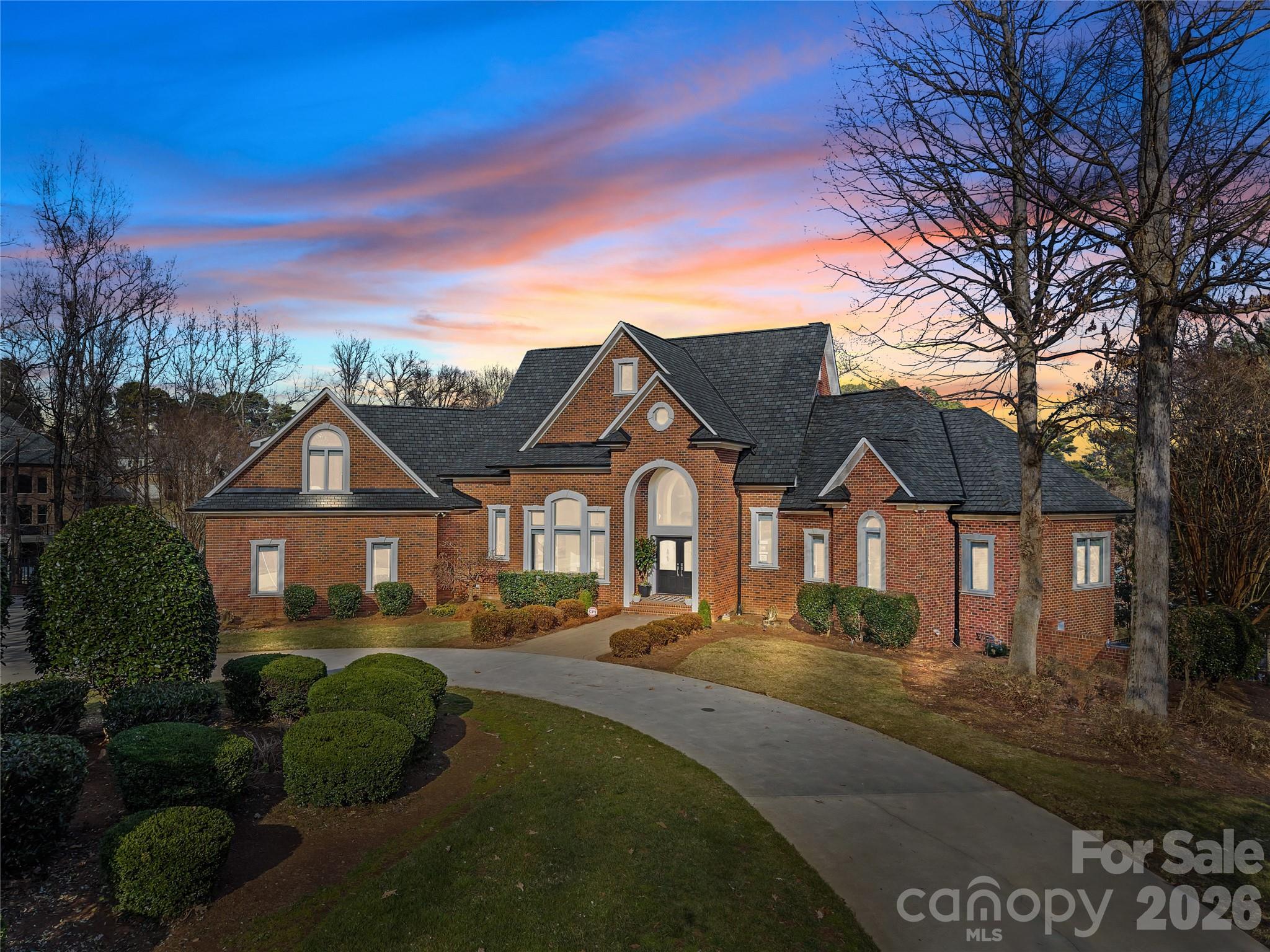 8052 Westbay Road Denver, NC 28037 - Photo 2 of 45 a front view of a house with a yard
