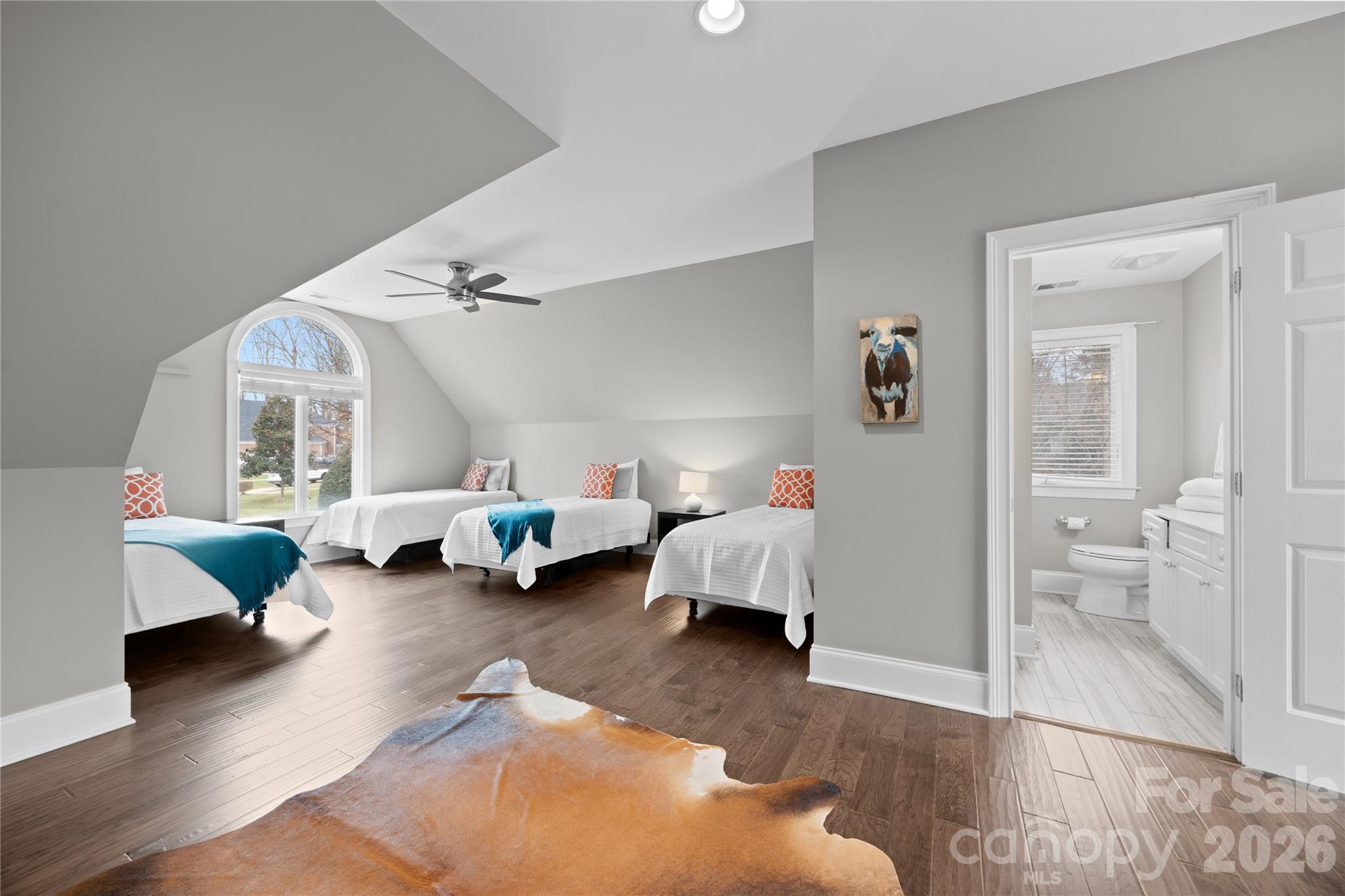 8052 Westbay Road Denver, NC 28037 - Photo 24 of 45 a living room with furniture and a table