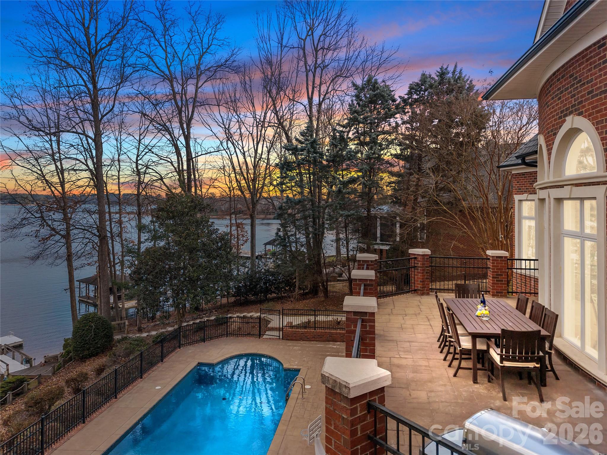 8052 Westbay Road Denver, NC 28037 - Photo 3 of 45 a swimming pool view with outdoor seating