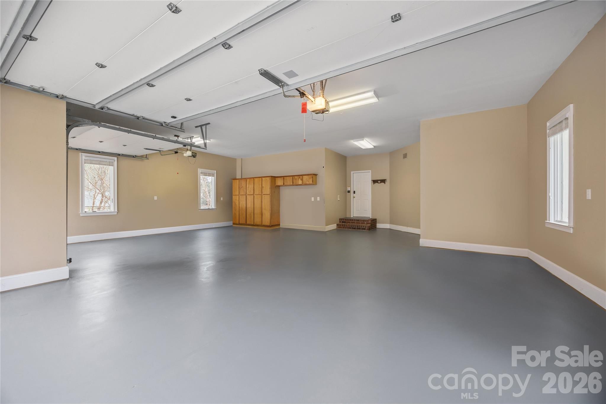 8052 Westbay Road Denver, NC 28037 - Photo 33 of 45 wooden floor in an empty room with a window