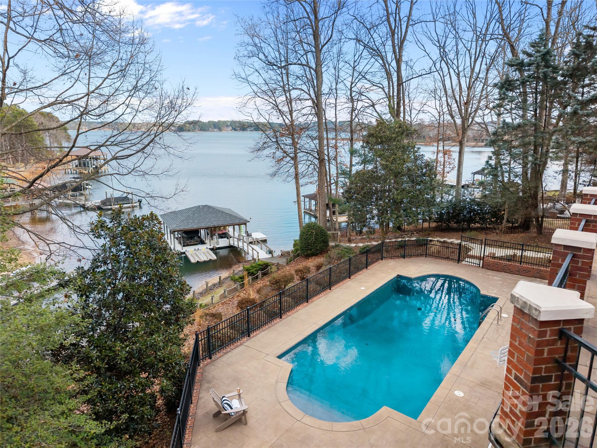 8052 Westbay Road Denver, NC 28037 - Photo 38 of 45 a view of a swimming pool with a patio