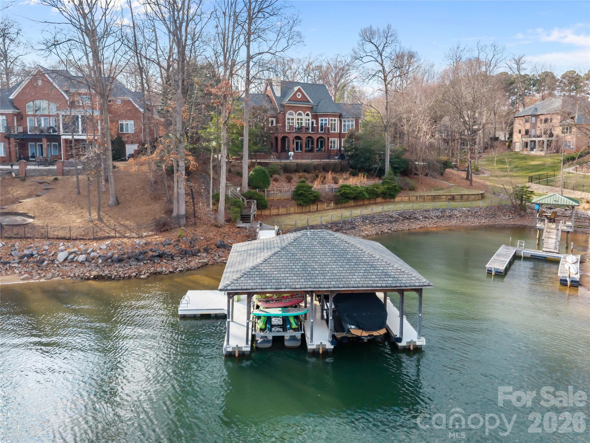 8052 Westbay Road Denver, NC 28037 - Photo 41 of 45 a aerial view of a house with swimming pool and lake view