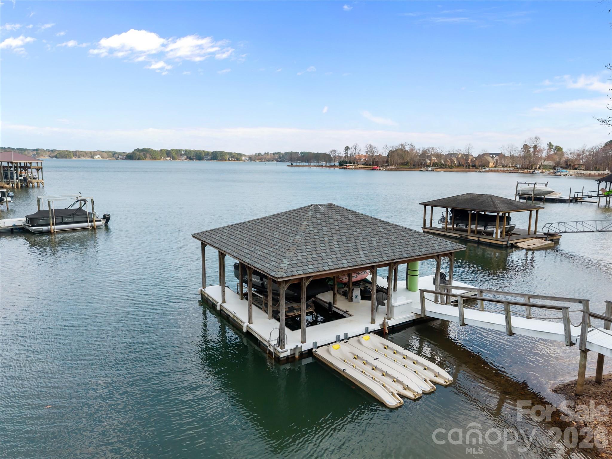 8052 Westbay Road Denver, NC 28037 - Photo 42 of 45 a view of a terrace with sitting area