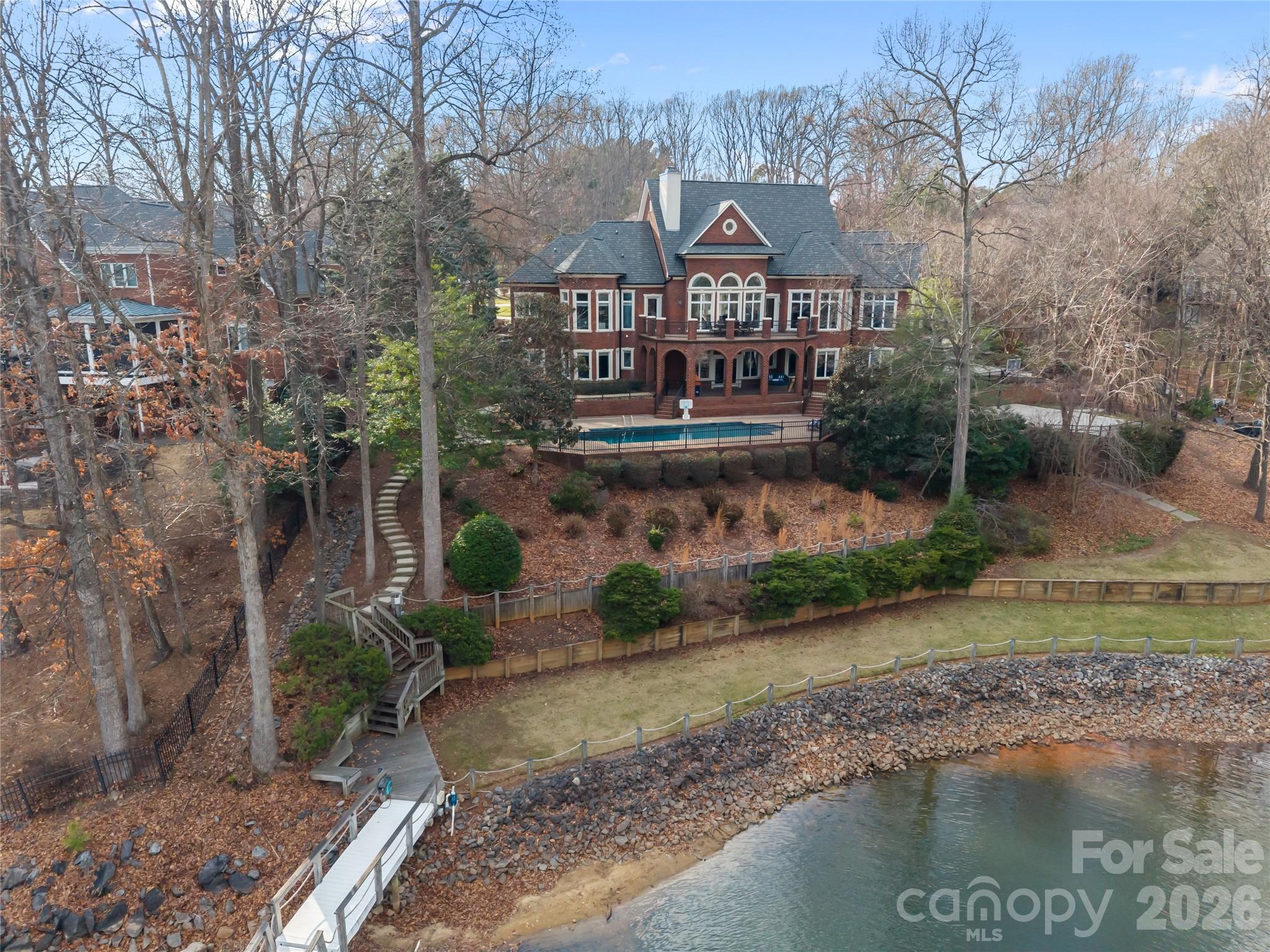 8052 Westbay Road Denver, NC 28037 - Photo 43 of 45 a front view of a house with a yard