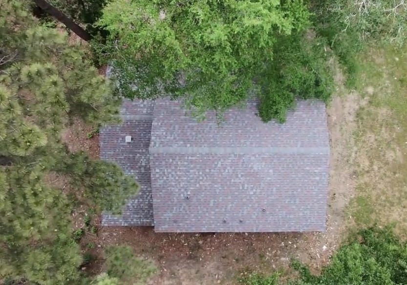 117 Amanda Street Conroe, TX 77304 - Photo 14 of 35 an aerial view of a house with a yard and a yard