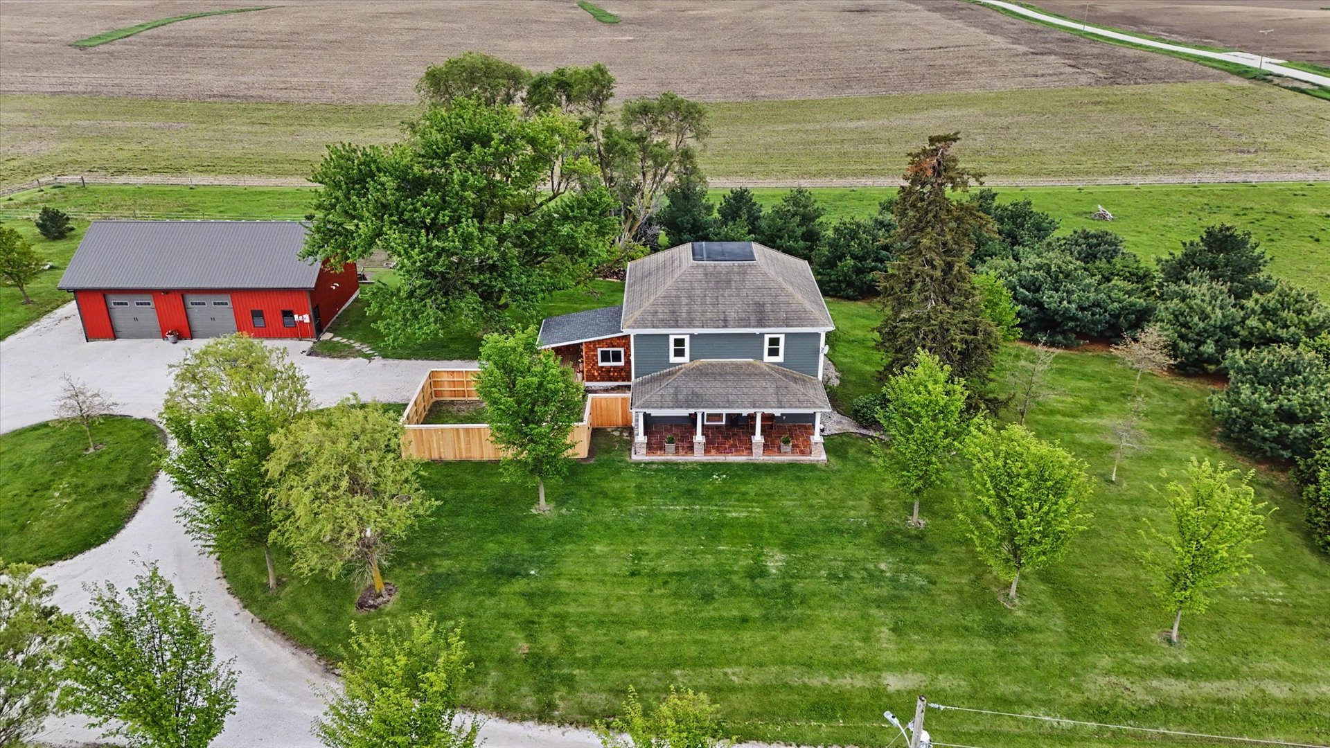 660 North 3000 E Road Strawn, IL 61775 - Photo 47 of 58 an aerial view of residential houses with outdoor space and trees