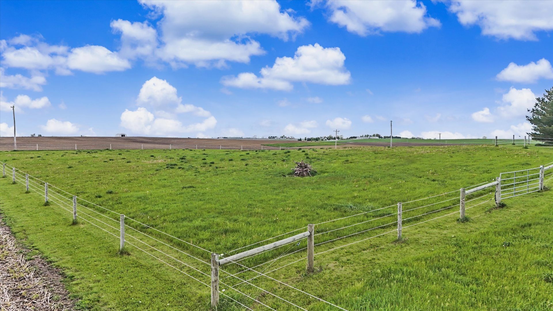 660 North 3000 E Road Strawn, IL 61775 - Photo 55 of 58 a view of a big yard with an outdoor space and seating