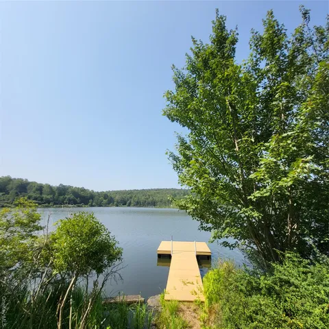 a view of a lake with outdoor space