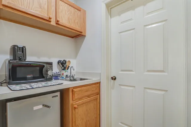 a kitchen with a stove and a microwave