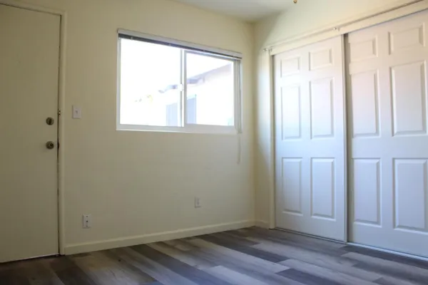 a bathroom with a sink toilet and mirror