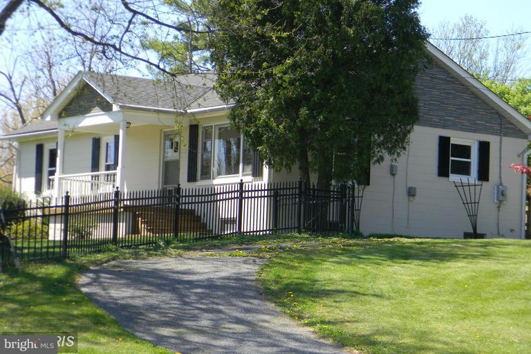 5615 Shookstown Road Frederick, MD 21702 - Photo 1 of 25 a front view of house with yard
