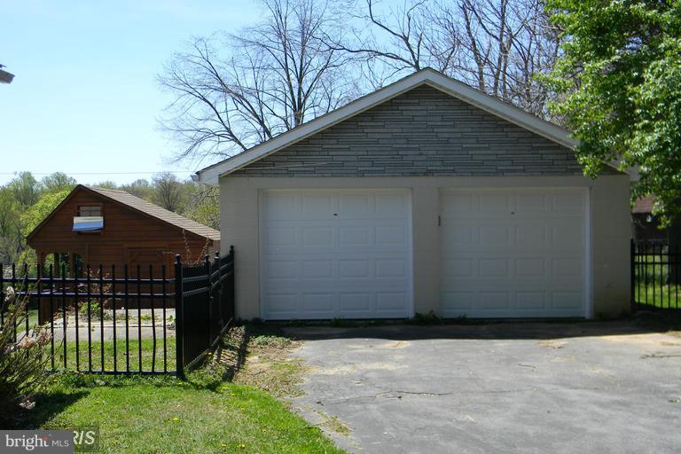 5615 Shookstown Road Frederick, MD 21702 - Photo 14 of 25 a front view of house with yard