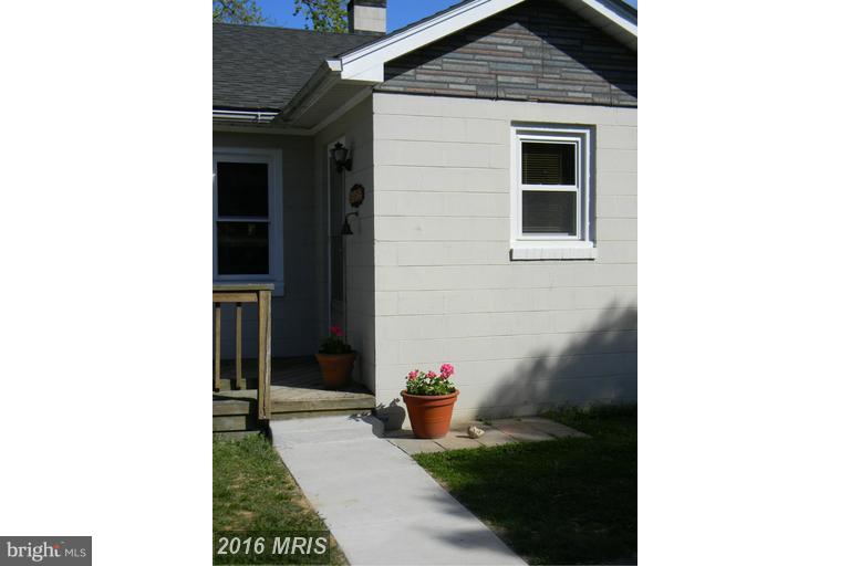 5615 Shookstown Road Frederick, MD 21702 - Photo 18 of 25 a view of a house with a yard