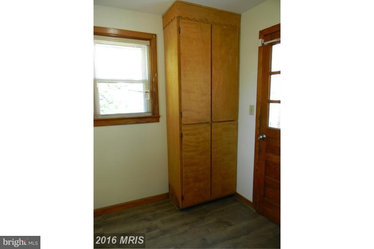 5615 Shookstown Road Frederick, MD 21702 - Photo 6 of 25 a view of a bathroom with a shower and a window