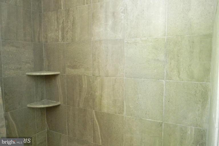 5615 Shookstown Road Frederick, MD 21702 - Photo 8 of 25 a bathroom with a shower