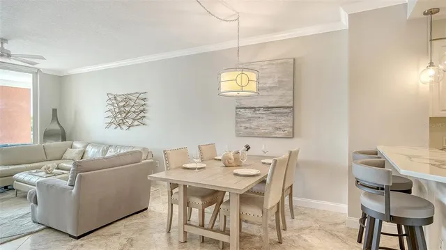 a kitchen with stainless steel appliances a stove sink and cabinets
