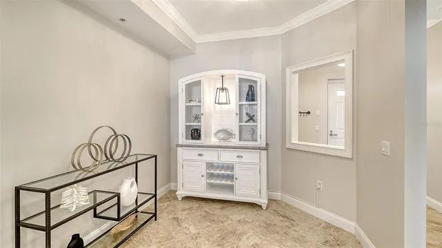 a view of a livingroom with furniture and ceiling fan