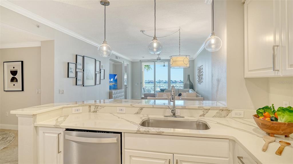 606 Riviera Dunes Way, Unit 306 Palmetto, FL 34221 - Photo 25 of 64 a bathroom with a sink and a mirror
