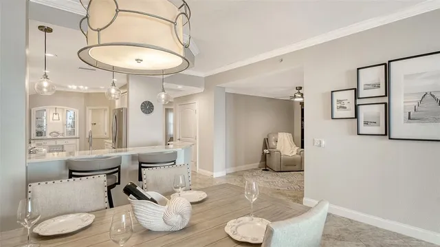 a bedroom with a bed and a mirror on dresser