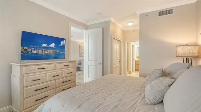 a bathroom with a granite countertop double vanity sink mirror and bathtub