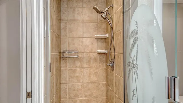 a view of a house with swimming pool and sitting area