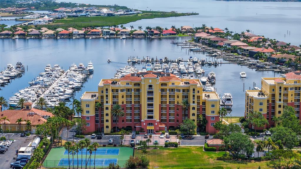 606 Riviera Dunes Way, Unit 306 Palmetto, FL 34221 - Photo 4 of 64 a view of a city and a lake view